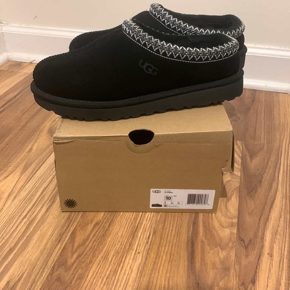 Uggs Tasman Slippers.. worn a couple times. Needs a new home. Comes with box.